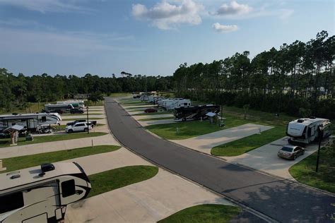 Whispering Pines RV Resort East & West - 10 Photos - Gulf Shores, AL