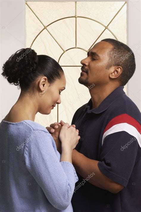 Couple Praying Together Stock Photo by ©DesignPicsInc 31755351