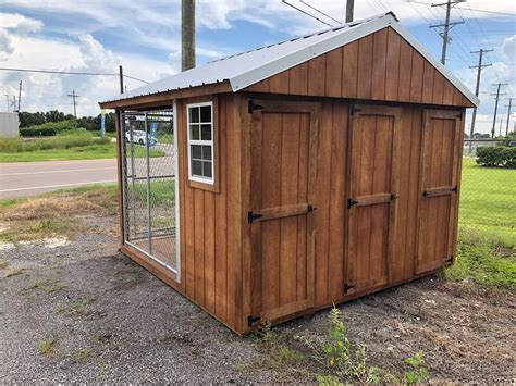 Backside of a Dog Kennel with three doors - Plant City Sheds