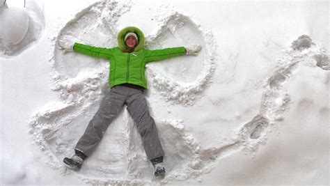 Snow Angel - Playing In Snow Stock Footage Video 919558 - Shutterstock