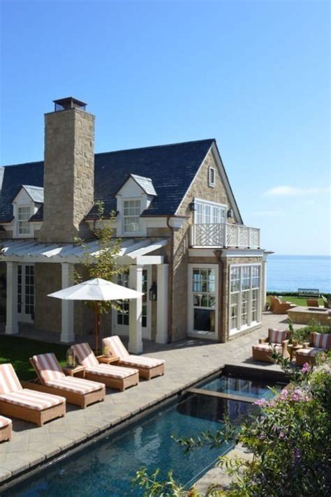 Classic East Coast-style home and lap pool overlooking the ocean ...