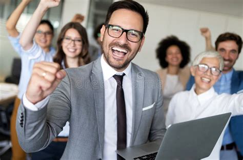 Happy Business People Celebrating Success at Company. Stock Photo ...