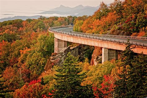 Linn Cove Viaduct and Fall Foilage Photograph by Matt Plyler