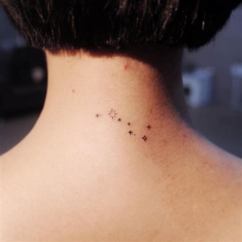 Big dipper tattoo on the back of the neck.