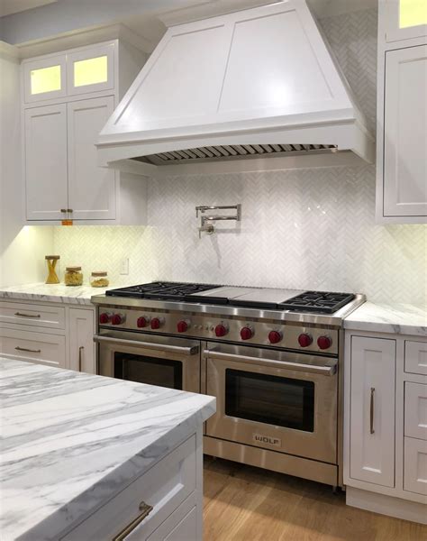 Thassos White marble herringbone kitchen backsplash