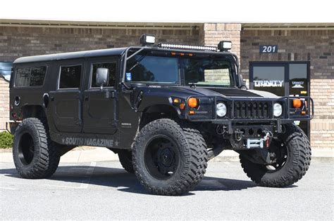 Lifted Hummer H1 on Moto Metals - Trinity Motorsports