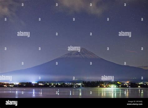 Lake and sky and landscape of Mount Fuji at night Stock Photo - Alamy