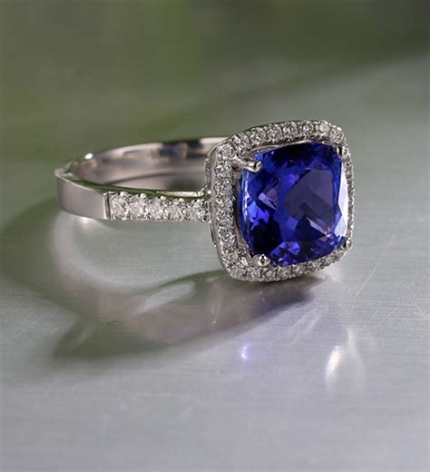 2 Carat cushion cut Blue Sapphire and Diamond Halo Engagement Ring in ...