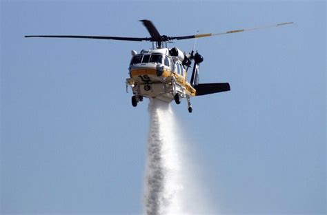 County takes possession of two new firefighting helicopters