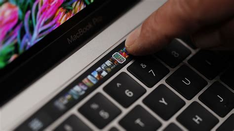 Apple is bringing a touchscreen to the MacBook Pro’s keyboard — and it ...