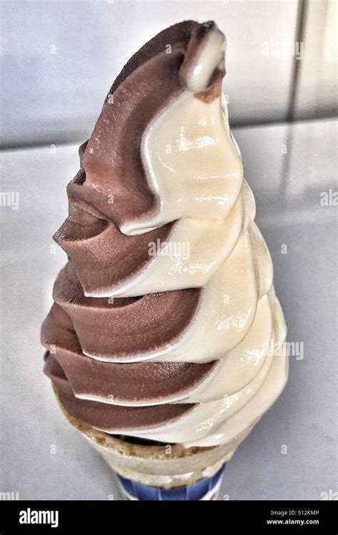 Chocolate vanilla swirl ice cream cone Stock Photo, Royalty Free Image ...