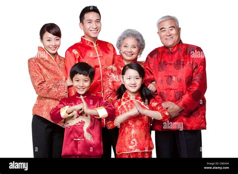 Family Dressed in Traditional Clothing Celebrating Chinese New Year ...