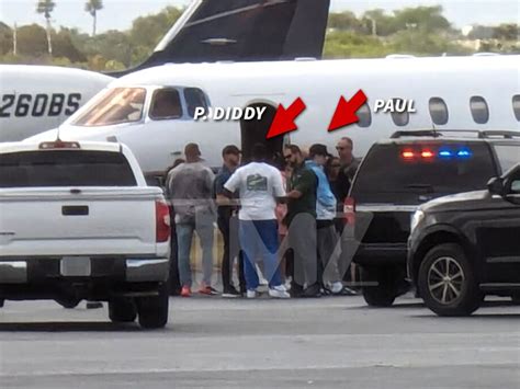 Diddy Seen Talking With Federal Agents At Airport As Associate Is Arrested