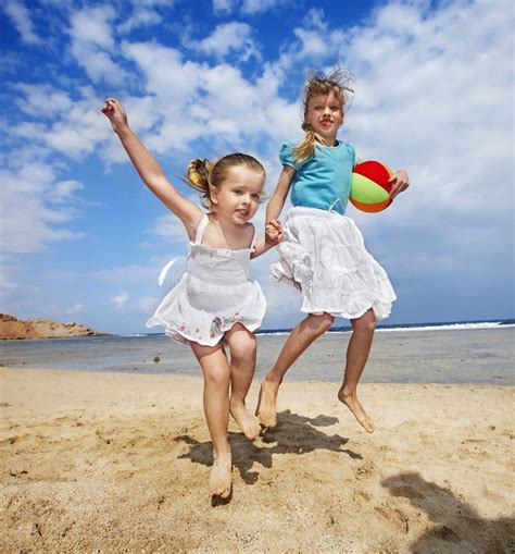 Children playing on beach. stock image. Image of coast - 18348395