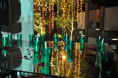 Green candles with a decorative lighting on the backdrop at the "Light ...