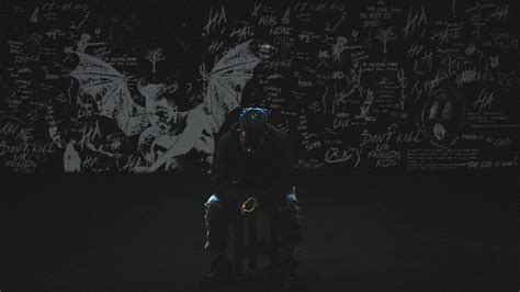 Download Xxxtentacion Blue Hair In Dark Room Wallpaper | Wallpapers.com