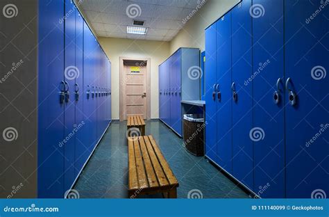 Large Blue Lockers and Wooden Bench Stock Image - Image of blue ...