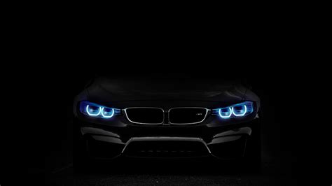 Download wallpaper 1366x768 bmw, car, blue headlight, dark, tablet ...