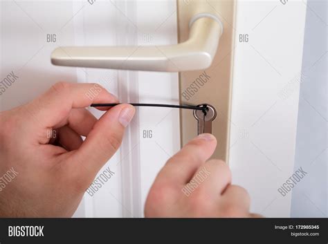 Close- Lockpicker Hand Image & Photo (Free Trial) | Bigstock