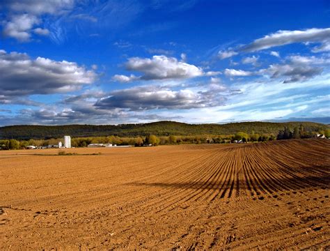 Brown farm land under the cloudy sky during daytime HD wallpaper ...