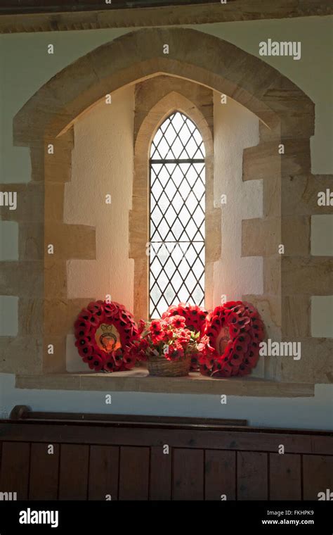 The Royal British Legion red poppy wreaths in window of St Mary's ...