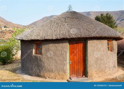 Traditional African Round Clay House With Thatched Roof In Village ...