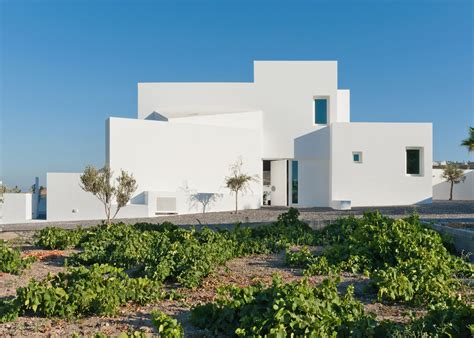 Santorini house by Kapsimalis Architects made of white blocks ...