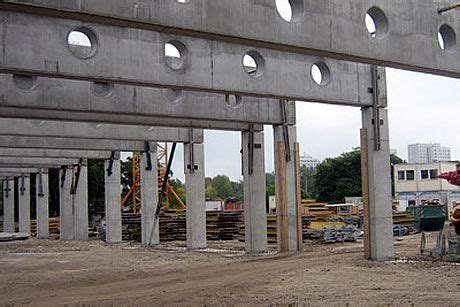 Prestressed concrete beams, 27 m long and 2 m deep, were supported by ...