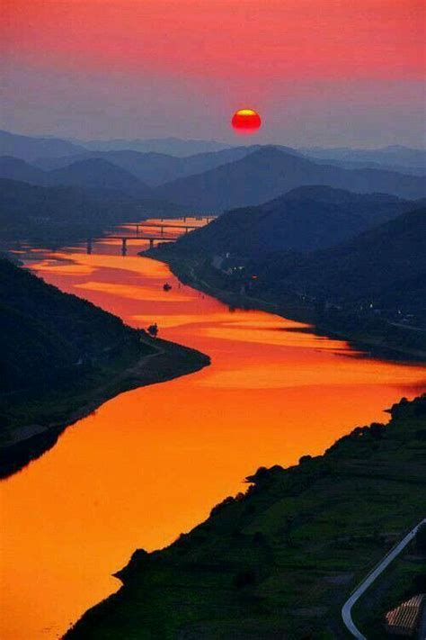 Khatija Suleman - Sun rise over the Orange River in South ...