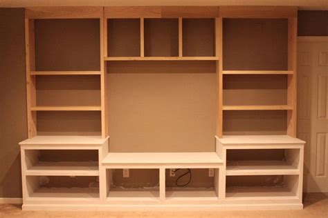 Diy wall unit | Wood entertainment center, Entertainment center diy ...