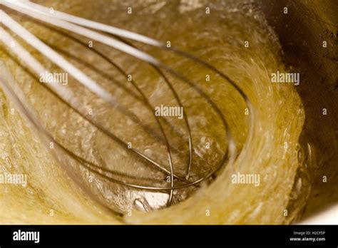 Whisking egg whites Stock Photo - Alamy