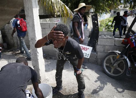 Thousands rally against Haitian president, clash with police