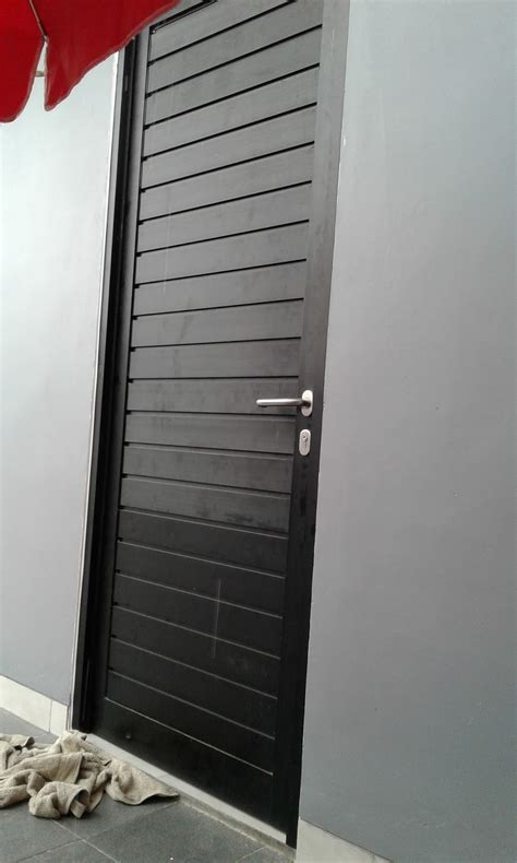 UTAMA ALUMINIUM DAN KACA: Kusen pintu swing panel aluminium jakarta barat