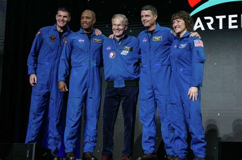 NASA names four astronauts who will circle the moon on Artemis II