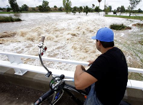 Record rainfall leads to deadly flooding in Arizona - CBS News