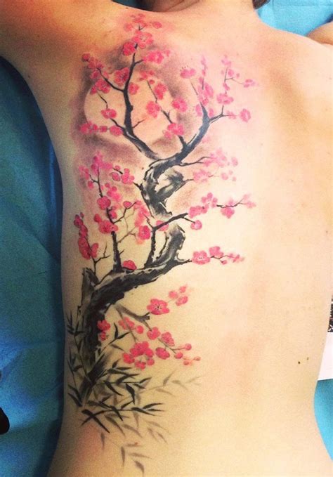 japanese cherry blossom tattoo on back - Piedad Benjamin