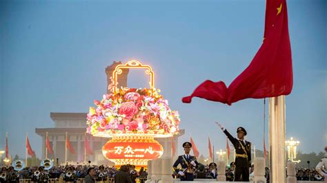 Beijing holds flag-raising ceremony on China's National Day - CGTN