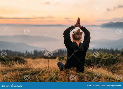 Woman Sits in a Mountain at Sunrise Stock Image - Image of girl, person ...