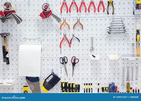 Picture of Working Tools Hanging on Board Stock Image - Image of board ...