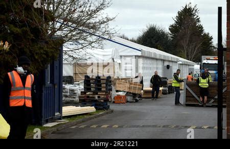 Photograph of a temporary mortuary being constructed in the main car ...