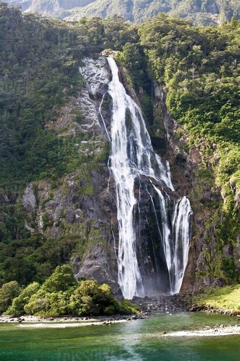 Bowen Falls, Milford Sound, New Zealand - Stock Photo - Dissolve