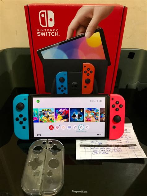 Nintendo Switch Oled with games, Video Gaming, Video Game Consoles ...