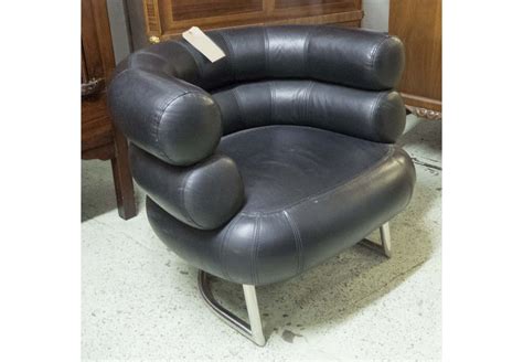 BIBENDUM STYLE CHAIR, after Eileen Gray, black leather finish.