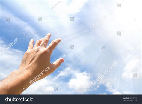 Adult Hand Reaching Out Towards Sky Stock Photo 114267397 - Shutterstock