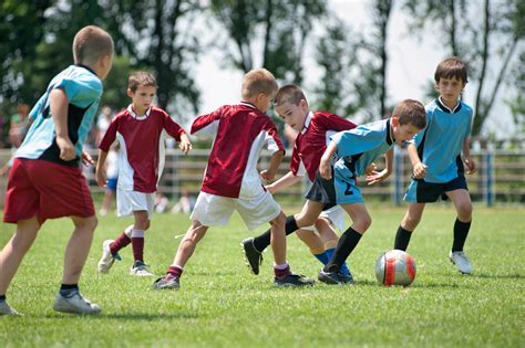 kids playing football outside - Bronchiectasis