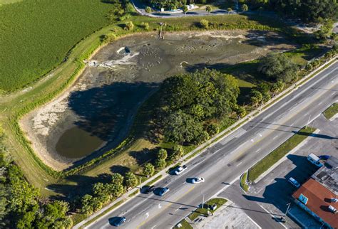 Sinkhole opens under Busch Gardens wastewater pond, dumps 2.5 million ...