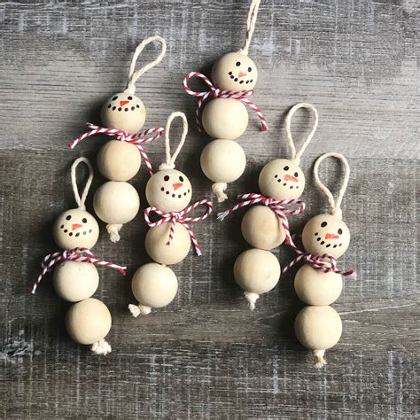 Wood Bead Snowman Ornaments | Christmas ornament crafts, Diy christmas ...