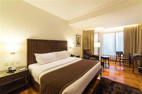 THE DELUXE ROOM (1 KING BED) | City Garden GRAND Hotel