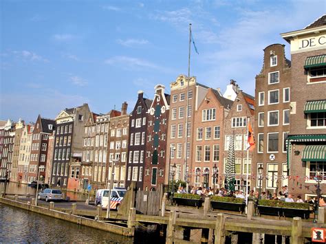 Dancing Houses on Damrak Canal in Amsterdam, Netherlands - Encircle Photos