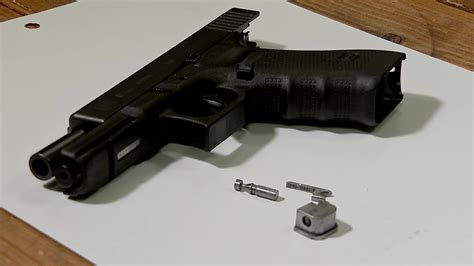 13 Investigates how a penny-sized 'Glock switch' can turn a handgun ...